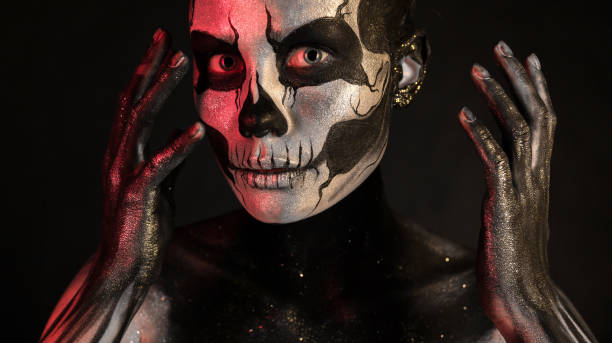istock Pretty girl with skeleton makeup 865257468