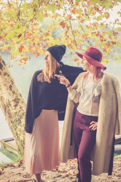 istock Female friends in autumn 865257714