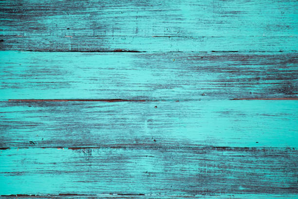 istock Blue color, grunge old scratched wood board textured background 865260024