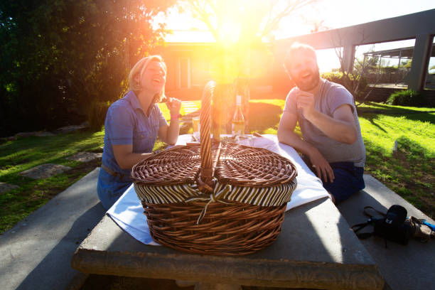 Couple having a romantic picnic at suset