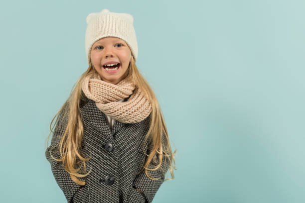 istock Cute pretty girl in warm clothes 865264736