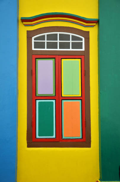 istock Colorful windows and details on a colonial house 865268698