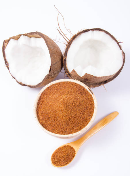 istock Coconut with coconut sugar isolated on white background. 865272194