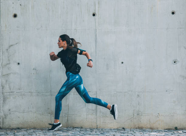 istock Sportswoman running 865272744