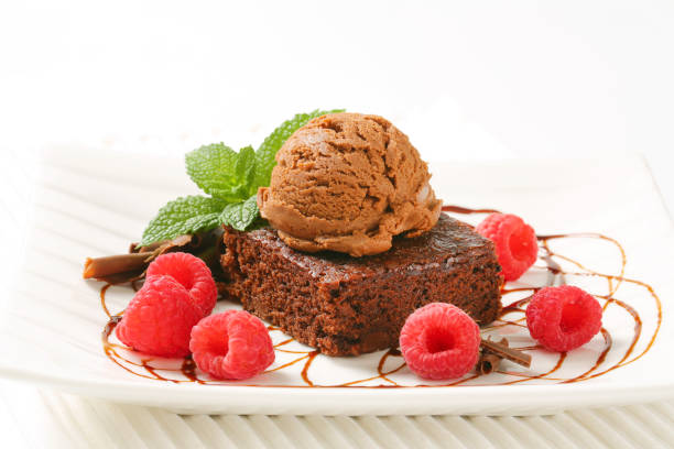 istock Brownie with ice cream and raspberries 865279876