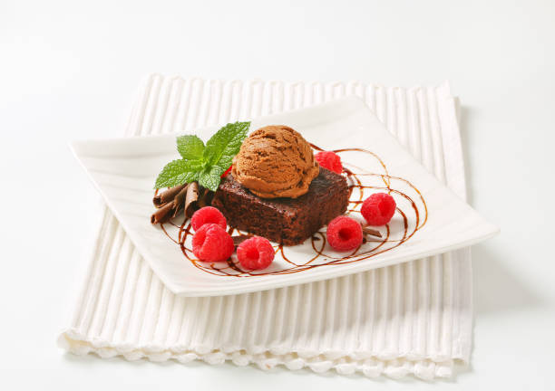 istock Brownie with ice cream and raspberries 865280024