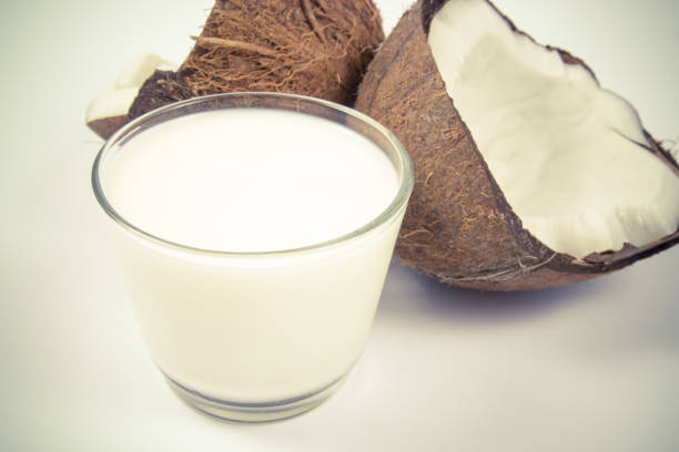 istock Coconut with coconut milk isolated on white background. 865282940