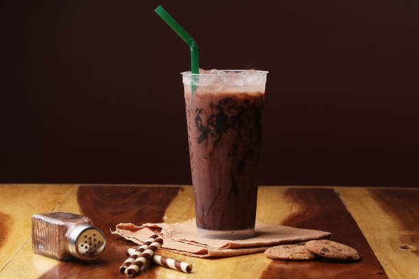 istock Ice cocoa soft drink on wood floor and topping 865292926