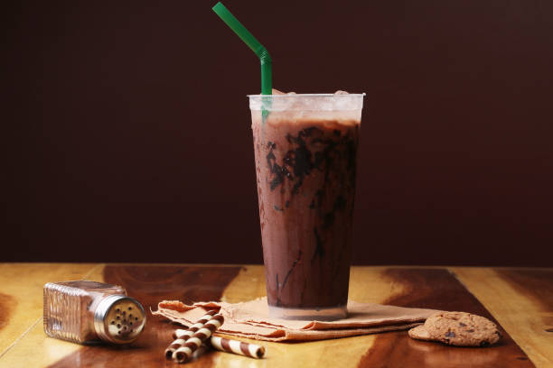 istock Ice cocoa soft drink on wood floor and topping 865293374