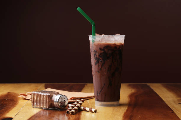 istock Ice cocoa soft drink on wood floor and topping 865293448