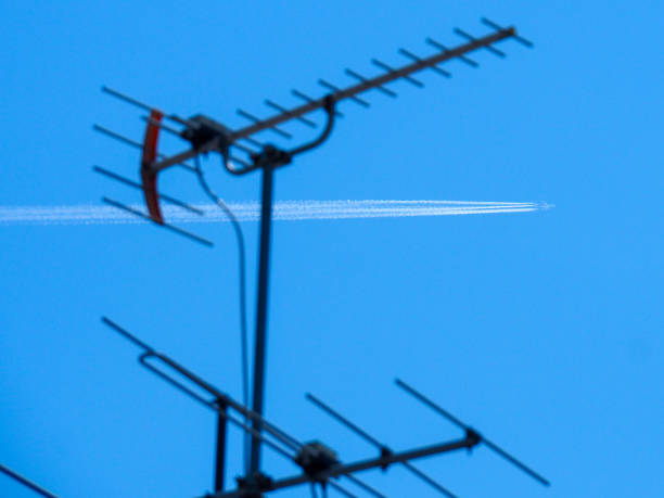 istock TV Antenna and Vapour trails 865298018