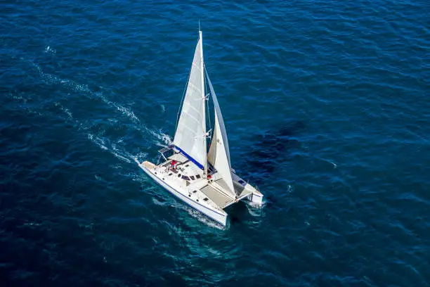 Aerial view of a catamaran navigating in the Indian Ocean