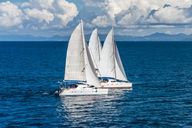 istock Three sailboats racing 865302648