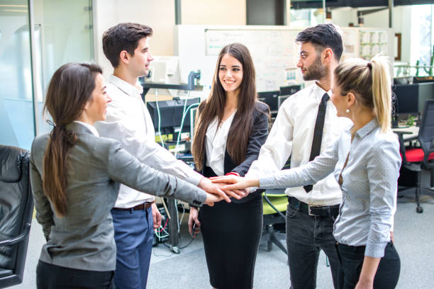 istock Business people join hand together during their meeting in office. 865302964