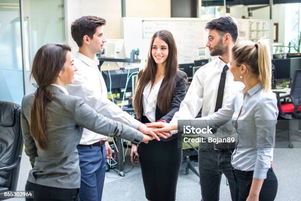 Business People Join Hand Together During Their Meeting In Office Stock Photo - Download Image Now