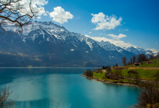 istock Blue lake in with snow capped mountains 865306250