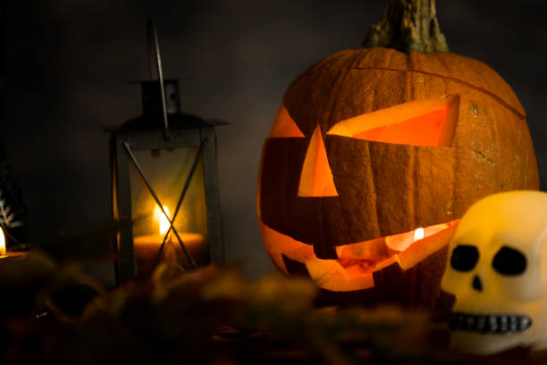 istock Halloween design with pumpkins. golden bokeh 865308976