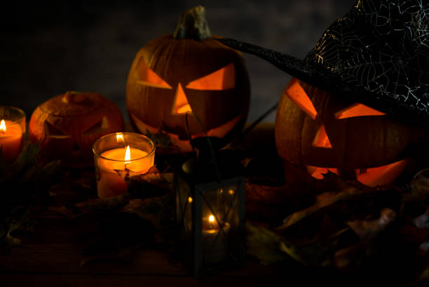 istock Halloween design with pumpkins. golden bokeh 865309148