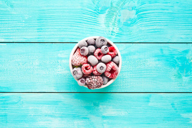 istock Various frozen berries on a bowl. Frozen berries 865320896