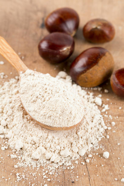 istock chestnut flour in a wooden spoon 865327802