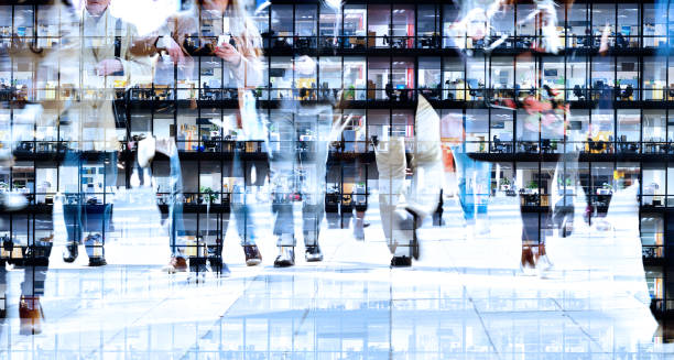 istock People crossing the street and also evening workplace building 865330100