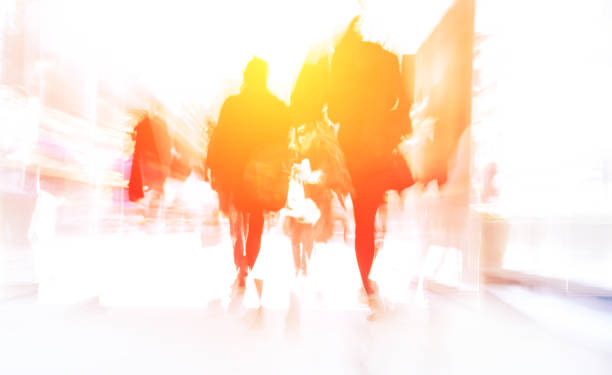 istock People leaving office in the evening sunset 865331430