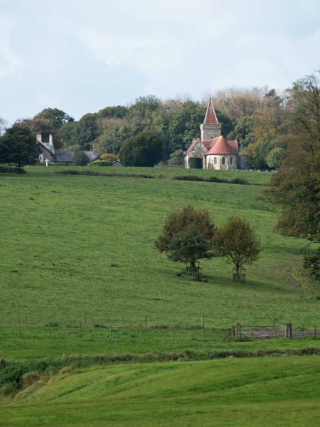 istock Parish church on a hill in Devon UK 865338946