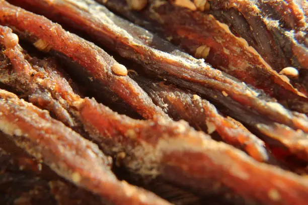 Photo of a close up macro shot of biltong (jerked meat).