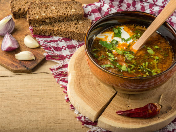 istock Borsch-soup with sour cream and bread. 865360618