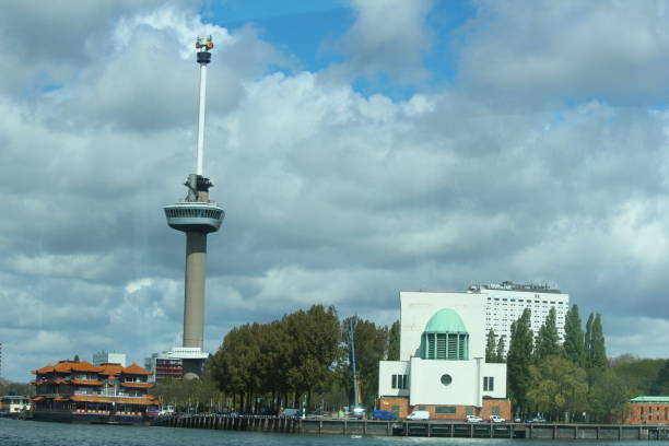 istock Euromast tower in Rotterdam along the Mullerpier with clouds 865361302