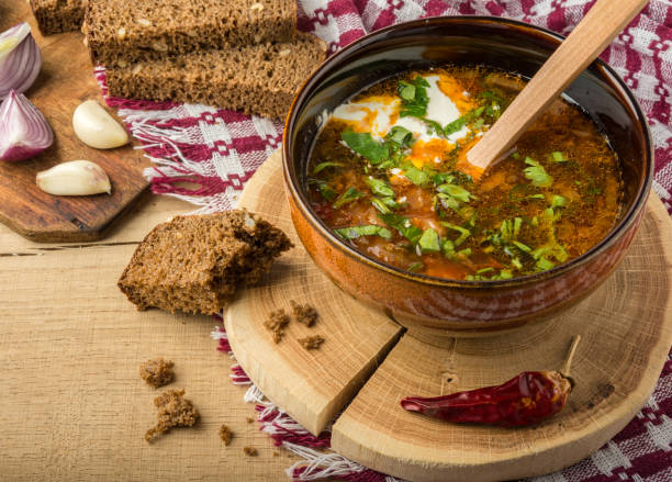 istock Borsch-soup with sour cream and bread. 865361460