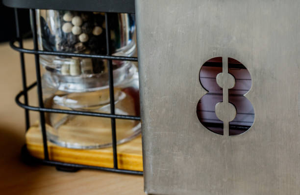 Shiny Metallic number 1 (one) on stainless steel surface. Abstract background