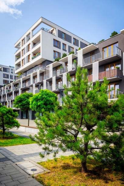 istock Town green square in front of apartment building 865367454