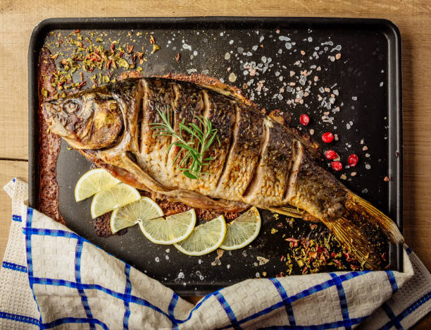 istock baked carp with spices top view 865371262