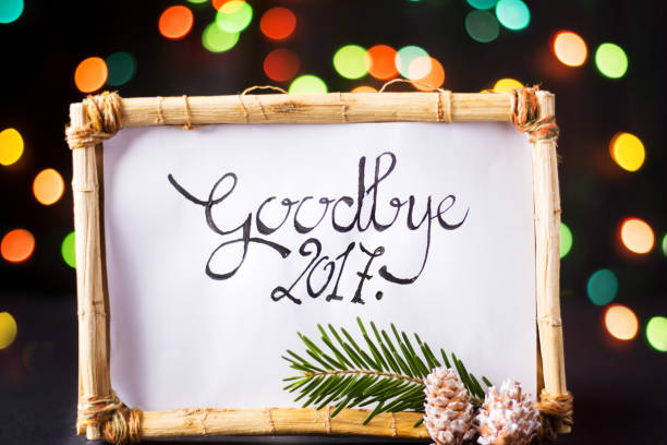 istock Goodbye 2017 card in a wooden frame 865375512