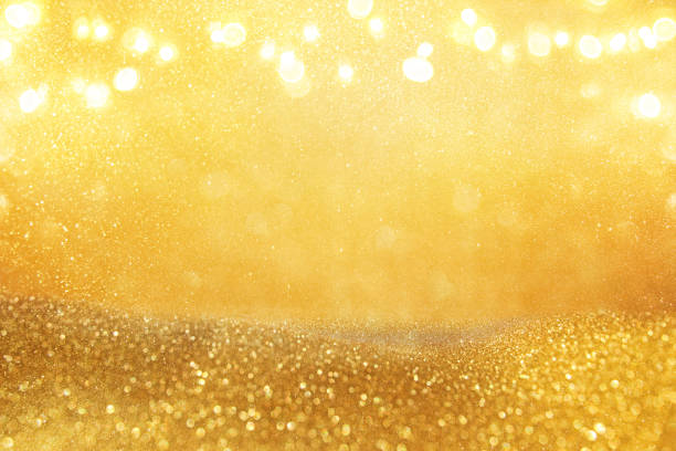 istock glitter vintage lights background. gold and black. de focused 865385918