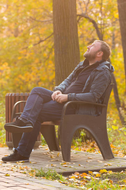 istock Man in park in autumn time 865388376