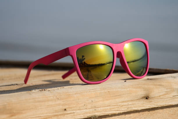 istock Exotic sunglasses on a wooden pier 865389386