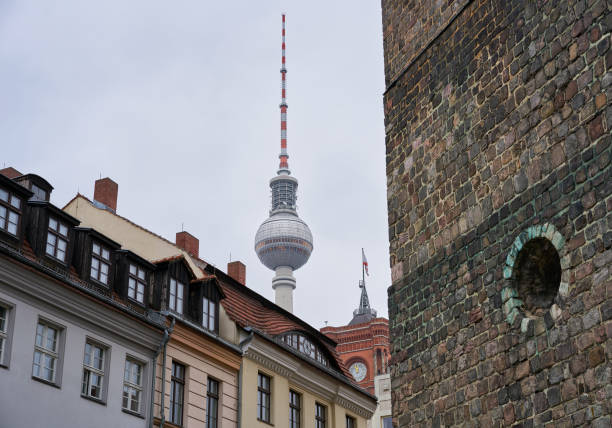 istock Berlin TV Tower on a cloudy day seen from Nikolaikirche Church 865392176