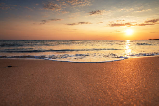 istock Beautiful tropical sunrise on the beach 865396034