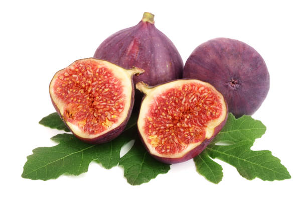 istock fig fruits with leaves isolated on white background 865399806
