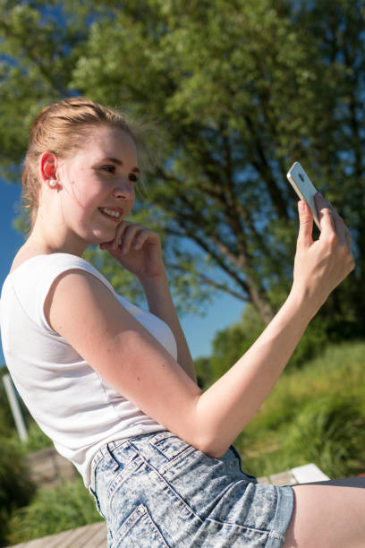 istock A young woman takes a selfie 865410136