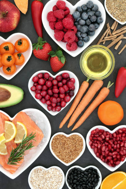comida sana para un corazón sano - nutritional supplement salmon food flax fotografías e imágenes de stock