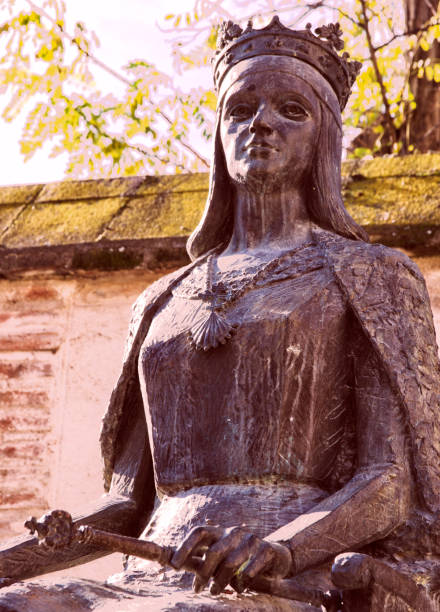 Elizabeth, the Queen Bronze statue located on the public road of the city of Alcalá de Henares (Madrid) alcala de henares stock pictures, royalty-free photos & images