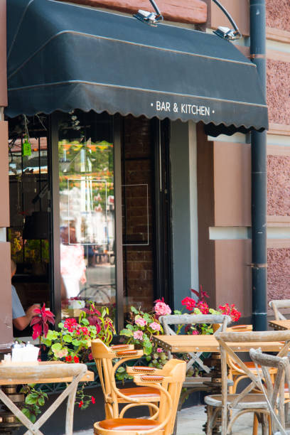 istock Empty tables and chairs on street cafe 865424446