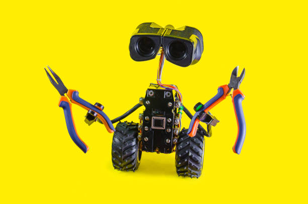 istock Repair serviceman robot on yellow background 865424638
