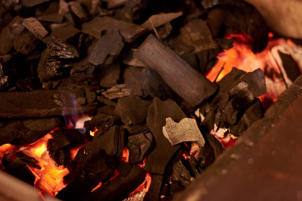 istock Black hot charcoal in bbq stove. 865424732