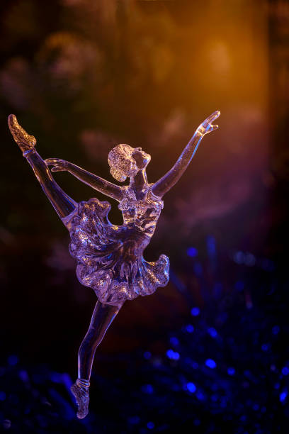 istock Glass ballet dancer on Dark background. Old style. Selective focus 865431234