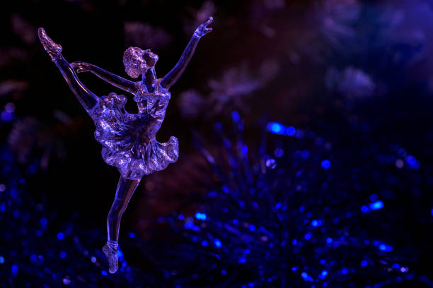 istock Glass ballet dancer on Dark background. Old style. Selective focus 865431306