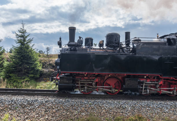istock The old  locomotive in forest in Harz, Germany 865431732